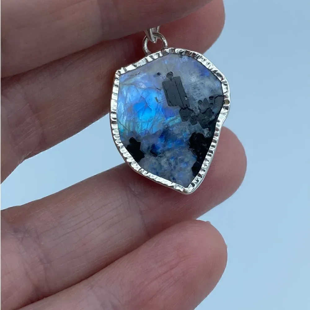 Black Tourmaline In Rainbow Moonstone Slice Sterling Silver Pendant